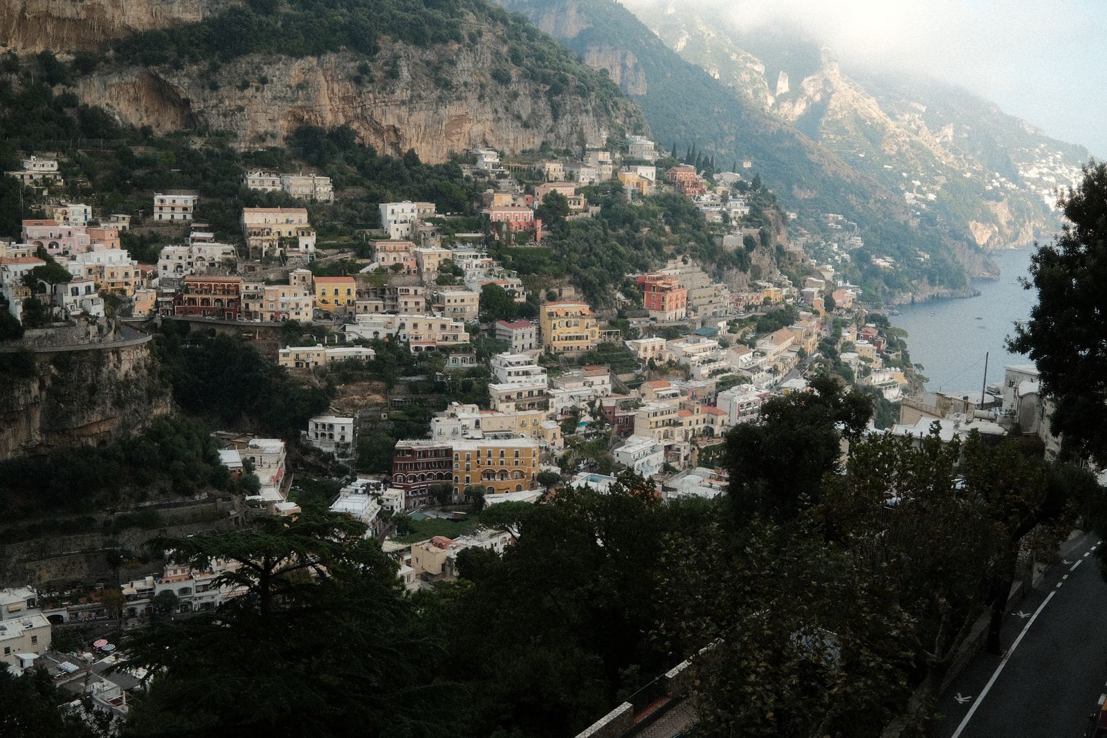 The houses of Positano stacked up the cliffs above the sea on the Amalfi Coast